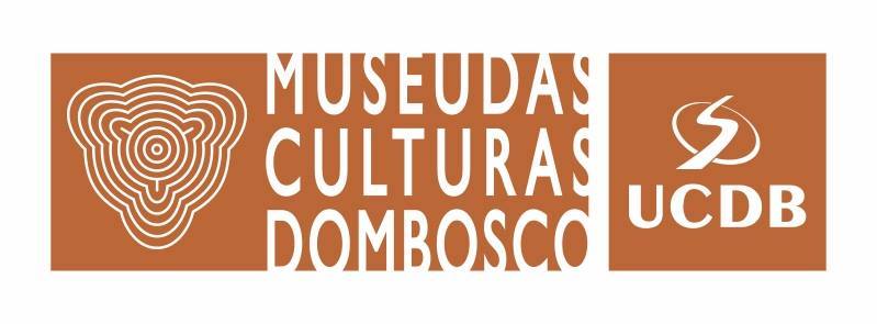 Logomarca do Museu das Culturas Dom Bosco e Universidade Católica Dom Bosco (UCDB) em letras na cor branca com fundo na cor laranja
